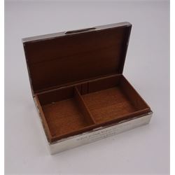 Modern silver mounted cigarette box, of rectangular form, with personal enraving to front and engine turned decoration and initials to cover, opening to reveal soft wood lined partitioned interior, hallmarked Frederick Field Ltd, Birmingham 1962