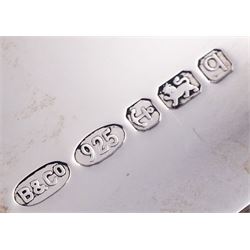 Modern silver letter opener with ring terminal, hallmarked Francis Howard Ltd, Sheffield 1977, L21.3cm, together with a modern silver money clip, of plain typical form, hallmarked W I Broadway & Co, Birmingham 2015, L5cm, each with maker's box, approximate total silver weight 2.45 ozt (76.2 grams)