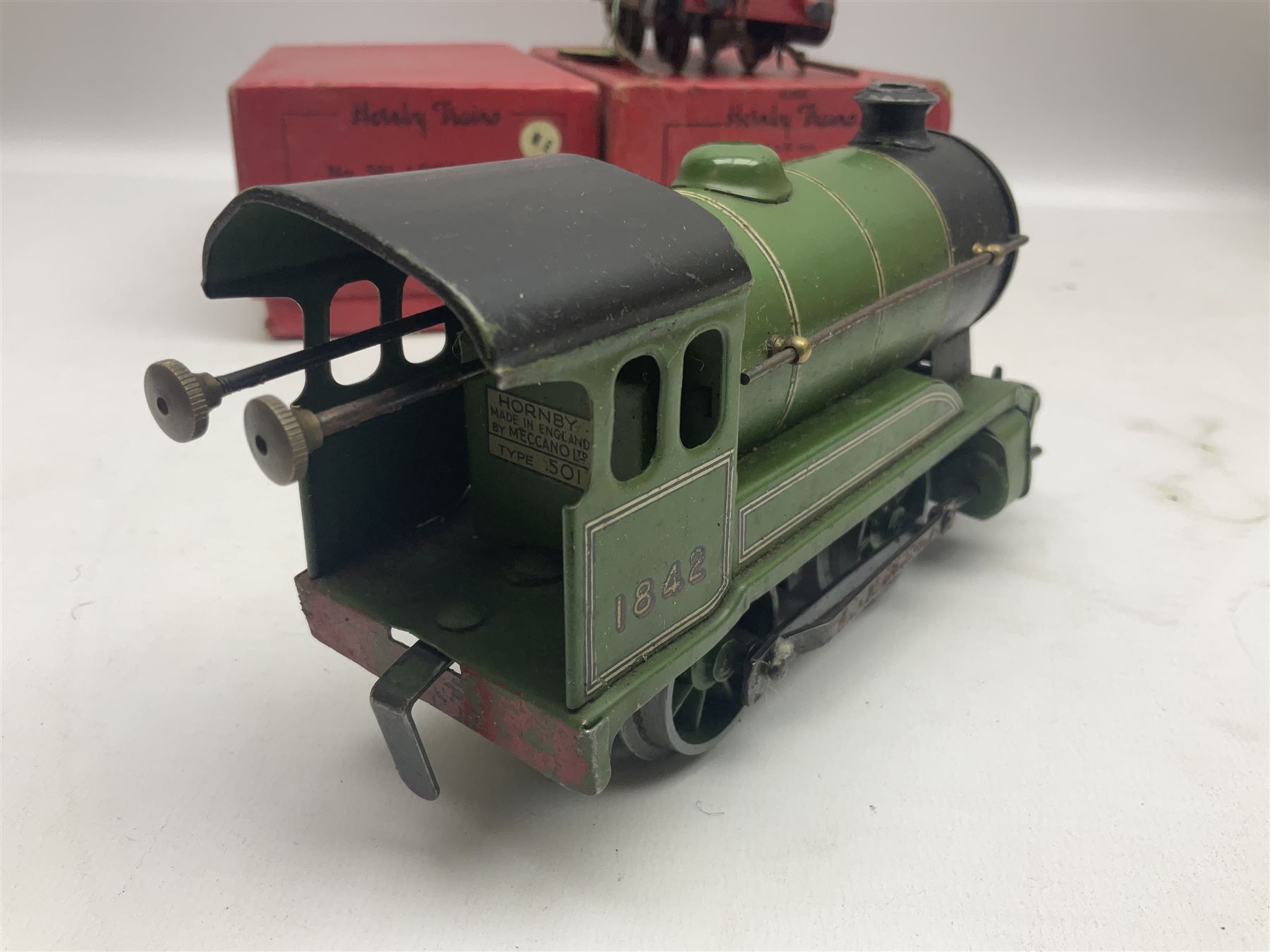 Hornby '0' gauge - No.501 clockwork 0-4-0 locomotive No.1842; boxed; No.501 Tender; boxed; No.101 clockwork 0-4-0 locomotive No.2270; and No.50 clockwork 0-4-0 locomotive No.60199 for spares or repair; boxed (4)
