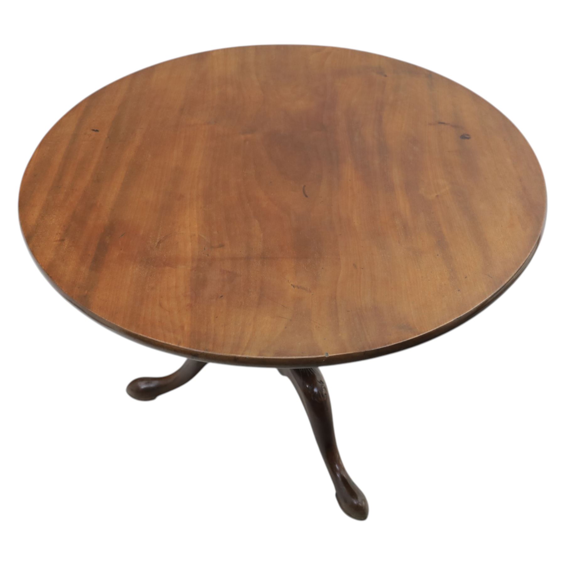 19th century quality mahogany tripod table, the circular tilt top supported on a turned baluster column with downswept cabriole legs carved with flower heads and terminating in pad feet