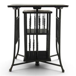 Edwardian black painted side table with incorporated revolving bookcase, supported on barley twist legs