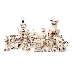 Collection of Mason ‘Mandalay’ pattern ceramics, to include vase and cover, two clocks, candle sticks, wall vases, ginger jar etc 