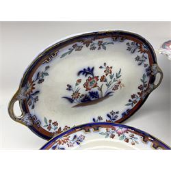 Victorian Wedgwood part dessert service, comprising comport, three circular and two oval tazzas, and ten plates, decorated with flowers in the Imari palette, each impressed beneath Wedgwood Pearl and with pattern number 4003 in iron red, comport H18.5cm, plates D23cm