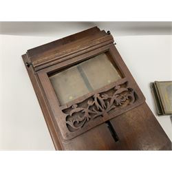 Victorian mahogany table top stereograph viewer, the top section with folding stereoscope and sliding image holder with fret work top, together with glass stereoscopic views