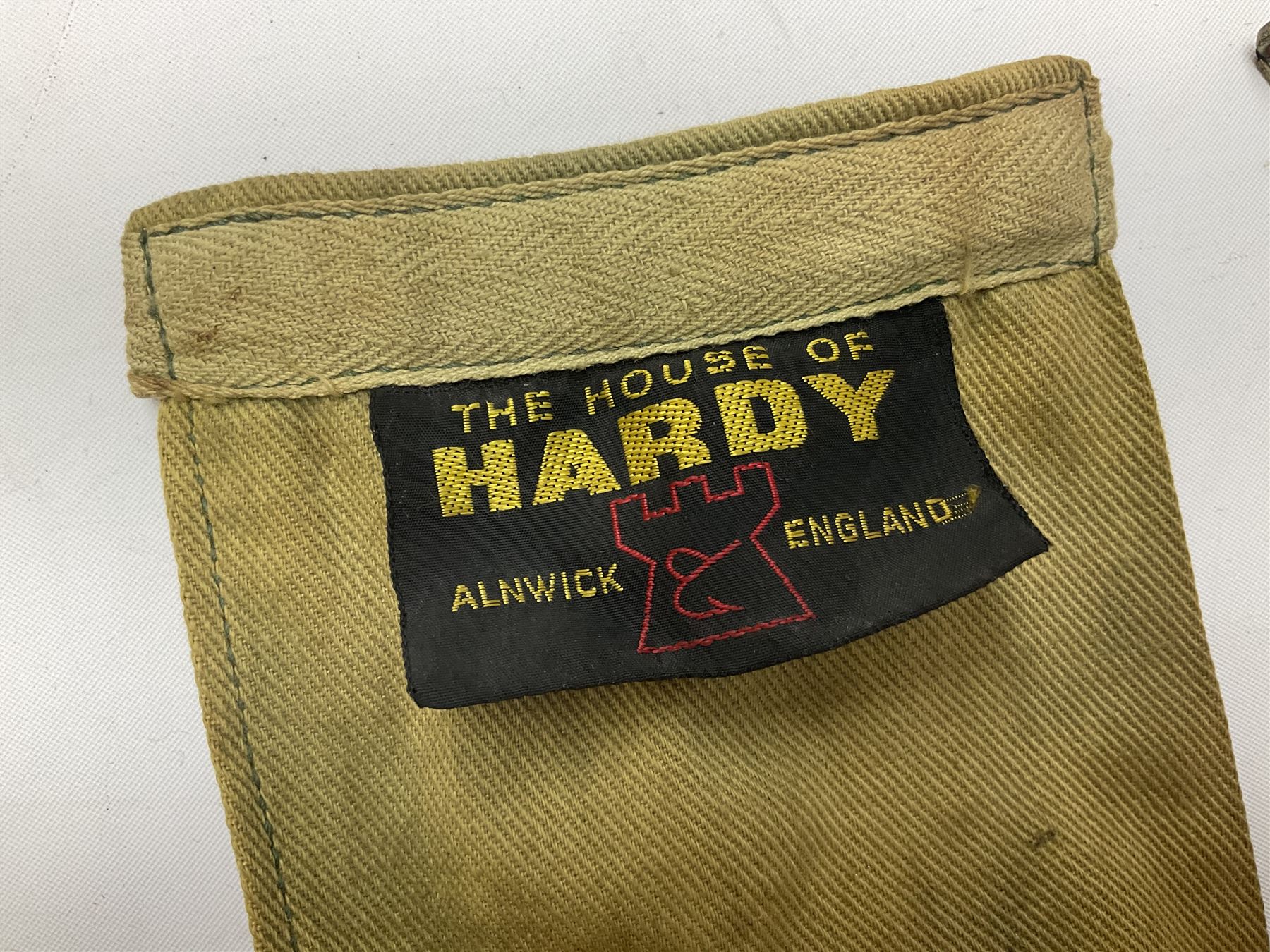 Hardy 'The Sir Edward Grey' two piece split can fishing rod, with cork handle and brass fittings marked Hardys, with a Hardy cover