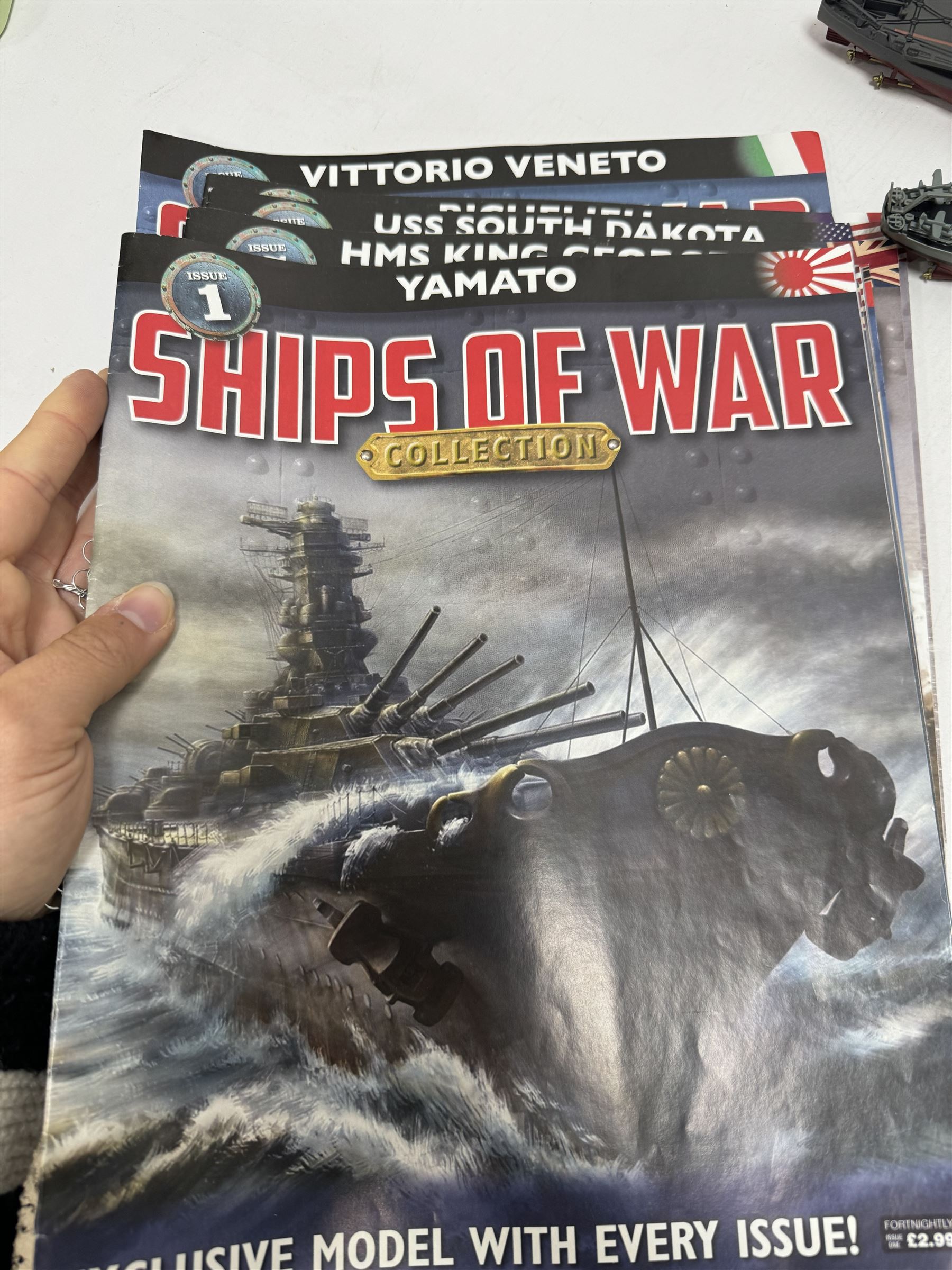Ten Warships of WWII 1:1000 scale models with ten corresponding issues of Ships of War magazines, comprising Issue 1 Yamato, Issue 3 Bismarck, Issue 4 HMS Prince of Wales, Issue 5 USS Massachusetts, Issue 6 Tirpitz, Issue 7 HMS King George V, Issue 8 Musashi, Issue 9 USS South Dakota, Issue 10 Richelieu and Issue 11 Vittorio Veneto, models in boxes/packaging