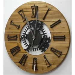  Large circular planked pine wall clock with Roman numerals, skeleton simulated workings with battery movement, D80cm  