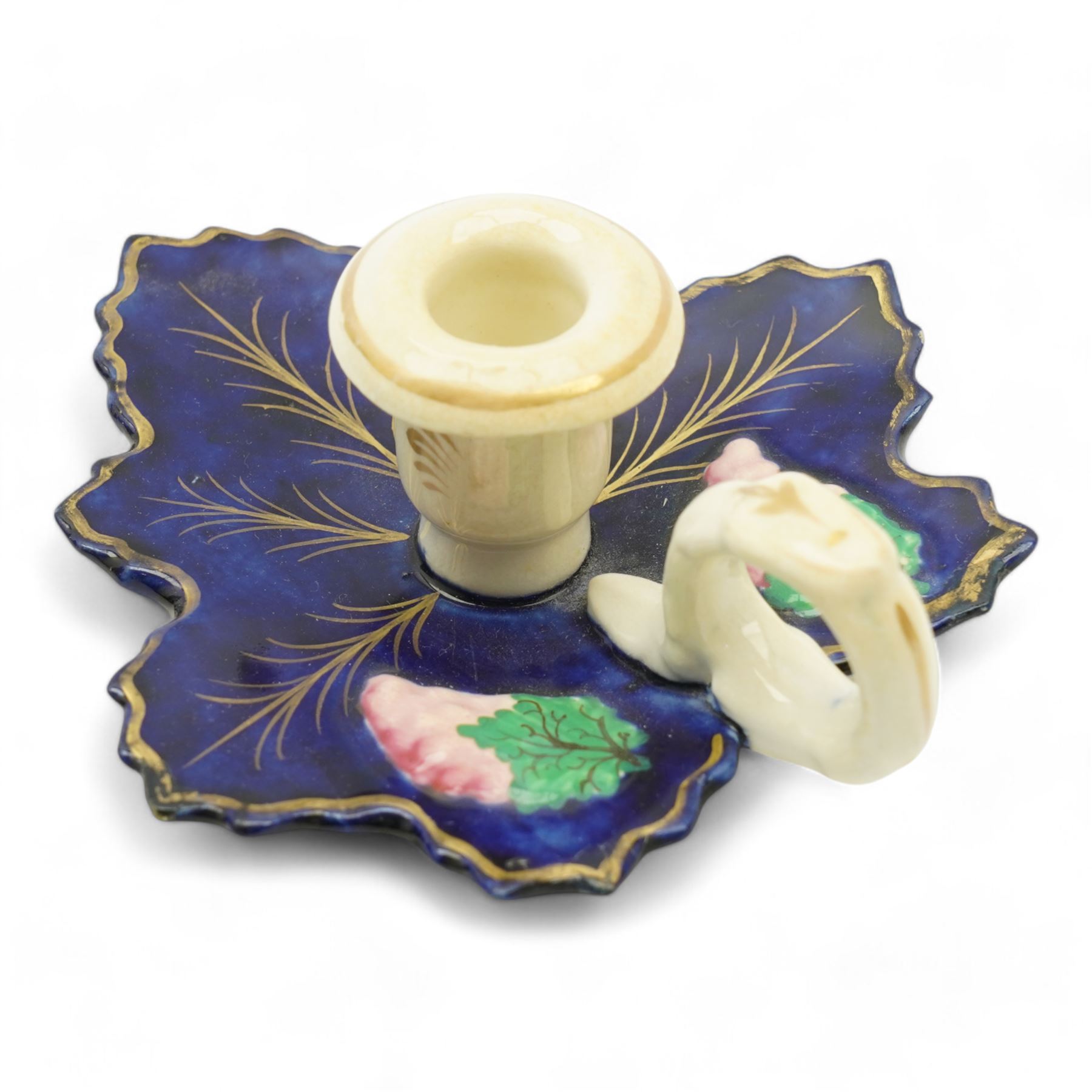 19th century porcelain campana form pot pourri vase, with associated cover, probably Derby, 18th century Worcester scale blue ground kakiemon coffee cup and saucer, c1770, Copeland and Garrett cylindrical vase with flared rim and four scroll supports, H12cm, porcelain chamber stick, modelled as a leaf with grapes flanking the ring handle and a Chinese Export egg cup 