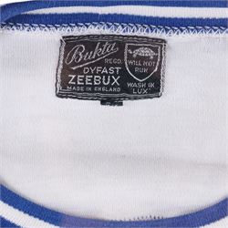 F.A. Cup Final Wembley 1963 Leicester City V Manchester United match worn long sleeved shirt, worn by Colin Appleton Leicester City captain, all white with striped blue collar and cuffs, embroidered cloth Leicester City badge with Wembley 1963 below, with Bukta Dyfast Zeebux label to inner collar, contained within a glazed wooden display frame with engraved plaque reading Colin Appleton (Capt) F.A. Cup Final Wembley 1963 Leicester City V Man Utd, frame H80cm

Notes: The 1963 F.A. Cup final was played on 25 May 1963 at Wembley 'Empire' Stadium. The final was won by Manchester United 3-1. 

Colin Harry Appleton (7 March 1936 – 31 May 2021) was an English footballer and manager. He captained Leicester during their 1962-63 season and the FA Cup final of this year. He then went on to captain them to the 1964 League Cup win. 

He later played for Charlton Athletic and Barrow, before playing for and managing Scarborough. He went on to manage Hull City, Swansea City, Exeter City and Bridlington Town.