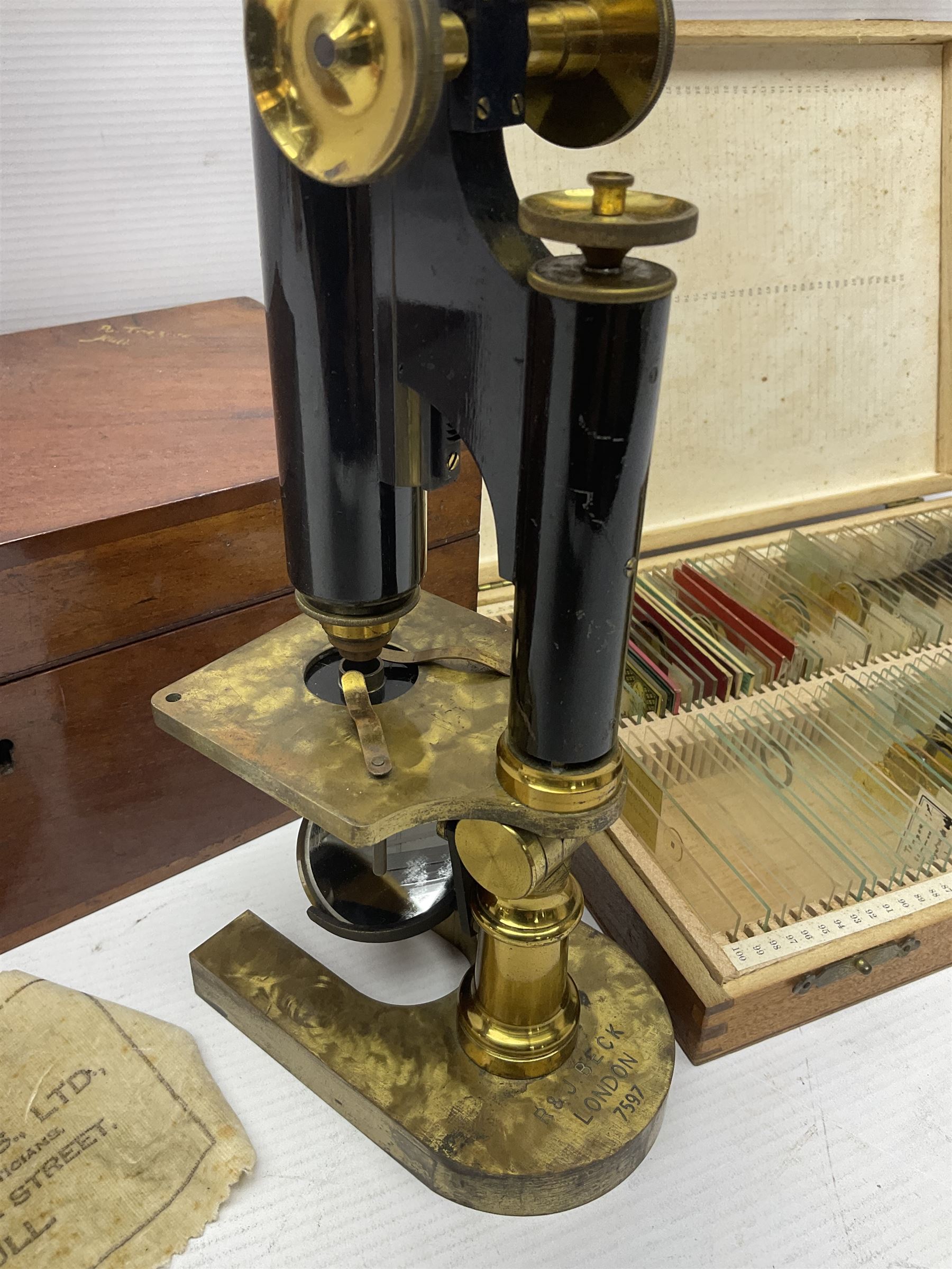 R & J Beck London microscope, model 7597, contained in fitted case, together with a boxed collection of glass microscope biological sample slides