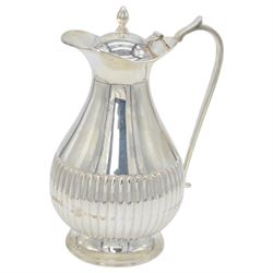 Late 20th century Indian Colonial silver six piece tea and coffee service, comprising coffee pot, hot water pot, teapot, milk jug, open sucrier and tray, all of oval part fluted form, the tea and coffee pot with ebonised wooden handles and finials, stamped SIL and with maker's mark for Cooke & Kelvey New Dehli, within two boxes and with original receipt for 1999