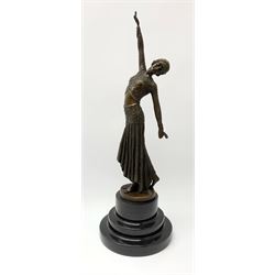 After Demetre Chiparus  (1886-1947), an Art Deco style bronze, modelled as a female figure, signed and with foundry mark, raised upon a circular stepped base, overall H37.5cm.