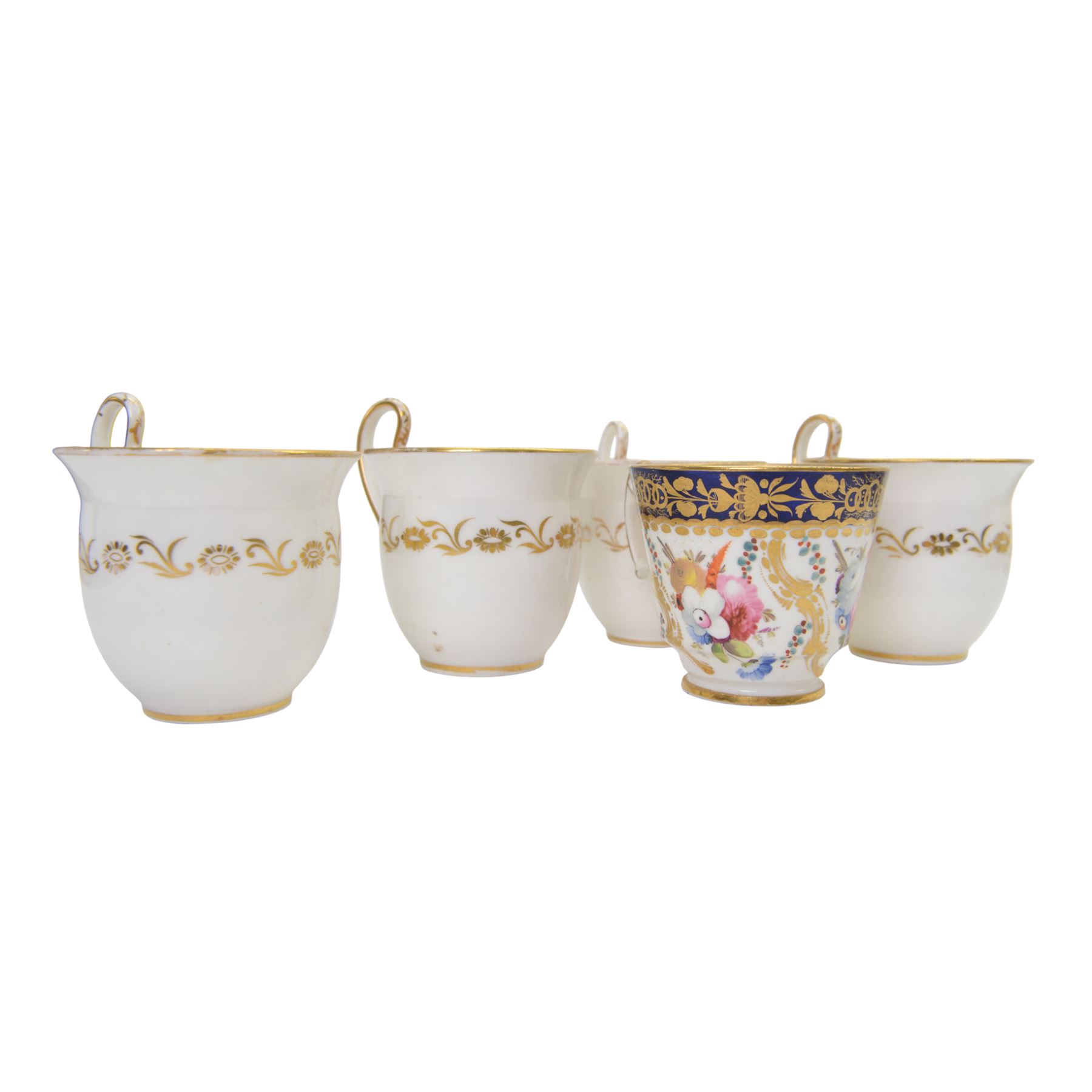 Coalport teawares, circa 1820-1840, comprising set of four trios, coffee cups, teacups and saucers, and slop bowl, decorated in the 830 pattern, with floral sprays and gilt shaped reserves, two further coffee cups and saucers, decorated with floral sprays upon blue grounds/with blue borders, and a similar coffee cup
