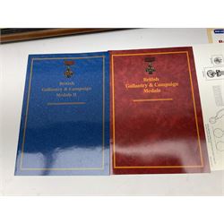 Two limited edition large framed display boards with half-size copies of British Gallantry and Campaign Medals produced by Danbury Mint and entitled 'For Valour'. Sixty medals on each board, all with ribbons. Complete with Danbury Mint certificate serial number A0148 and other paperwork.