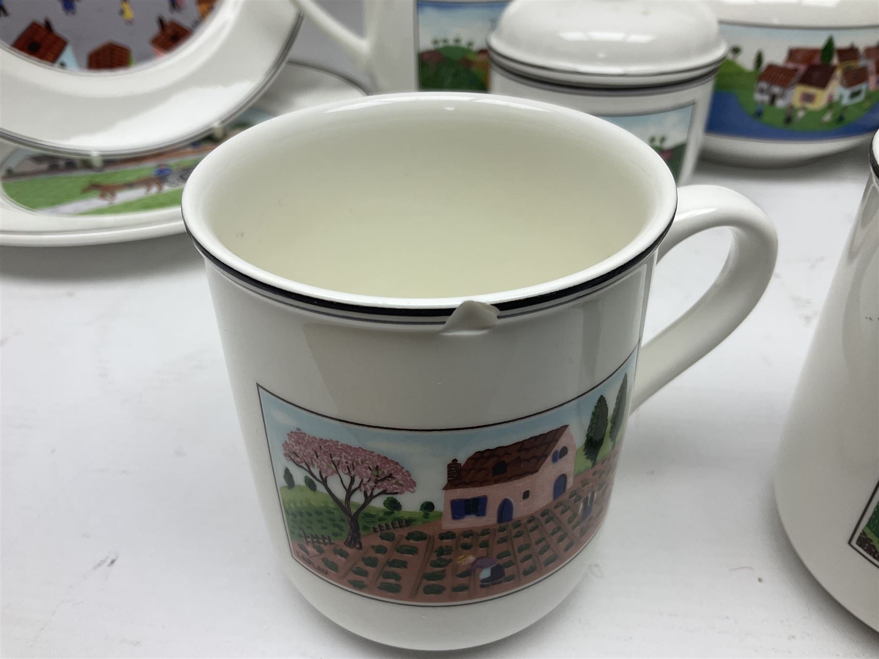 Villeroy and Boch Naif pattern tea service, comprising teapot, jug, covered sucrier, two mugs, two breakfast bowls and four side plates (11)