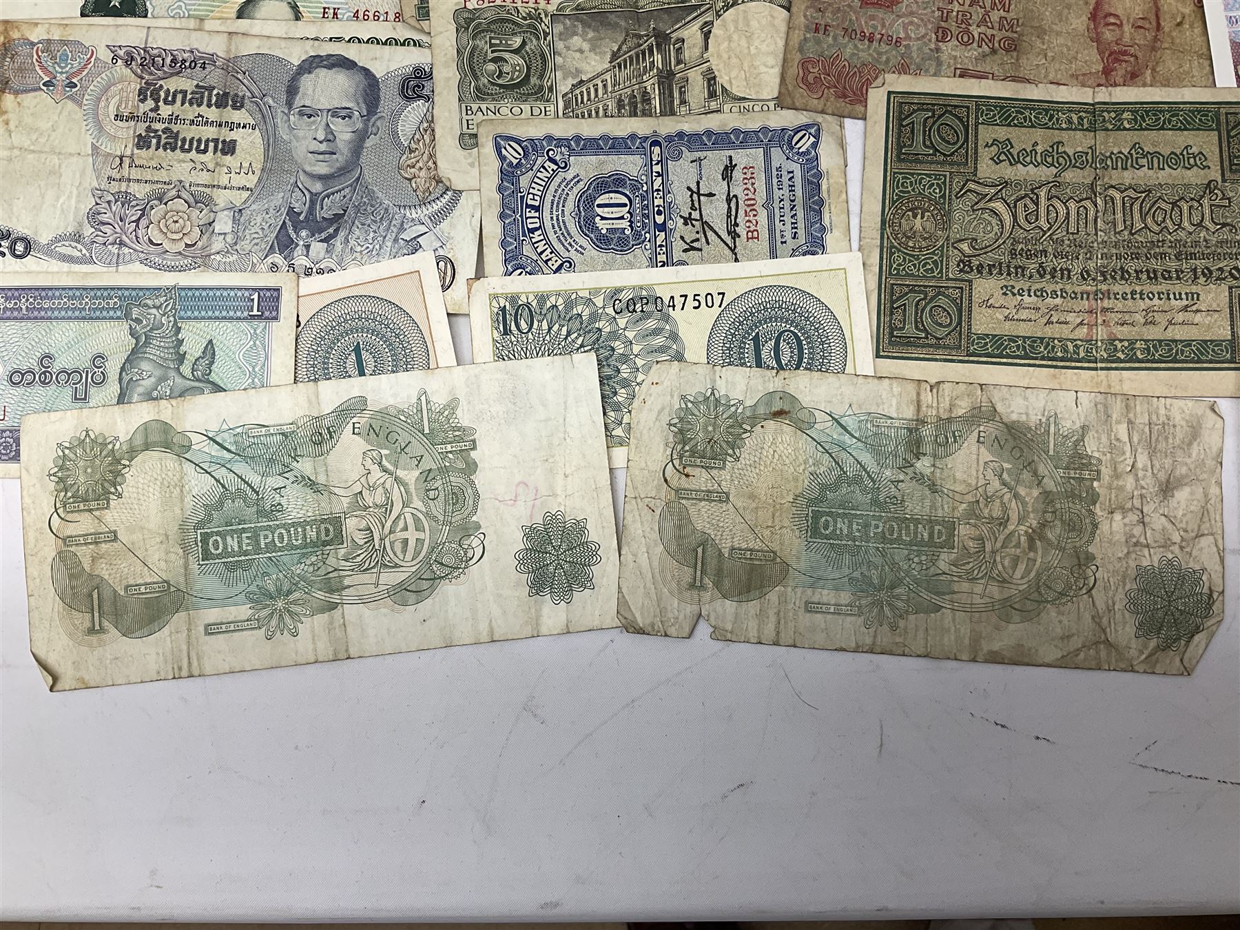 Great British and World banknotes, including Bank of England Page one pound 'EW57', Forde ten shillings 'C41N', various Belgian and Scottish notes etc