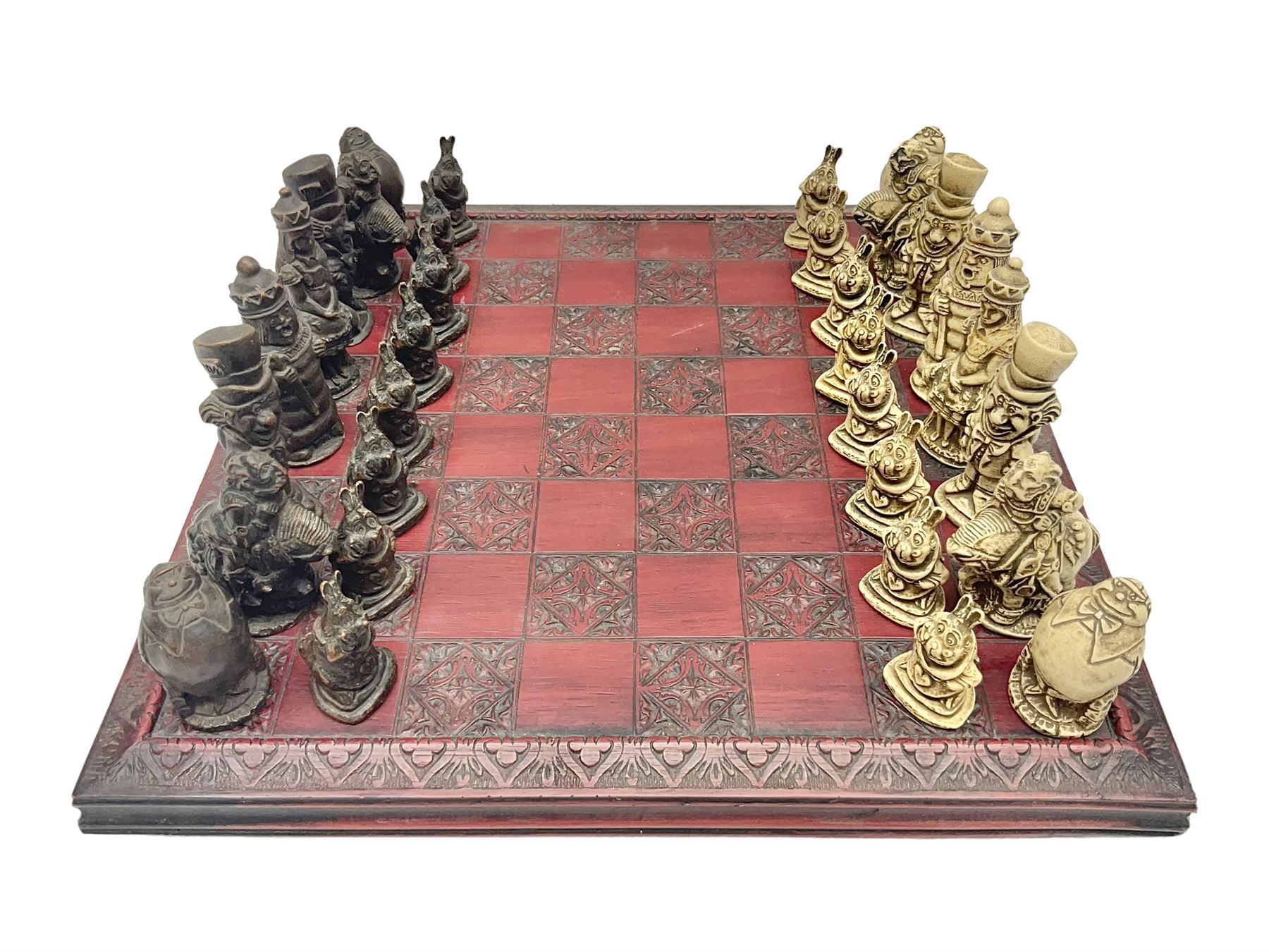 Alice in Wonderland themed chess set, with a complete set of composite figures, modelled as characters including Alice, Tweedledum and Tweedledee, the White Rabbit and the Mad Hatter, etc