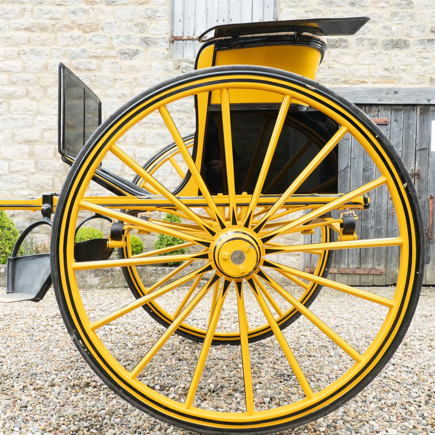 Victorian Two Wheeled Pleasure Driving Round Back Gig by Shanks of London

A Victorian two wheeled pleasure driving round back gig, painted in black and yellow, with upholstered forward facing seat for two, panelled dashboard, wooden spoked wheels, iron step and shafts for a single horse. The vehicle is fitted with a rear luggage compartment and mounted on elliptic springs.

Features
• Black and yellow painted body
• Upholstered forward facing seat
• Panelled dashboard
• Rear luggage compartment
• Wooden spoked wheels
• Iron step
• Elliptic spring suspension
• Shafts for a single horse

Dimensions:
Overall length: 310 cm
Width: 160 cm
Body width: 82 cm
Height: 160 cm

Wheel Diameters:
Wheels: 138 cm

Seating:
Driver and passenger: 2