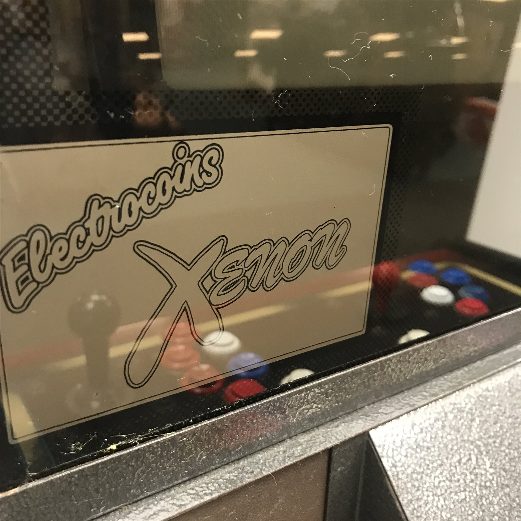 Electrocoin 'Xenon' arcade machine, with two game cartridges 'R-Type Leo' and 'Seibu Soccer', W69cm, H187cm, D93cm