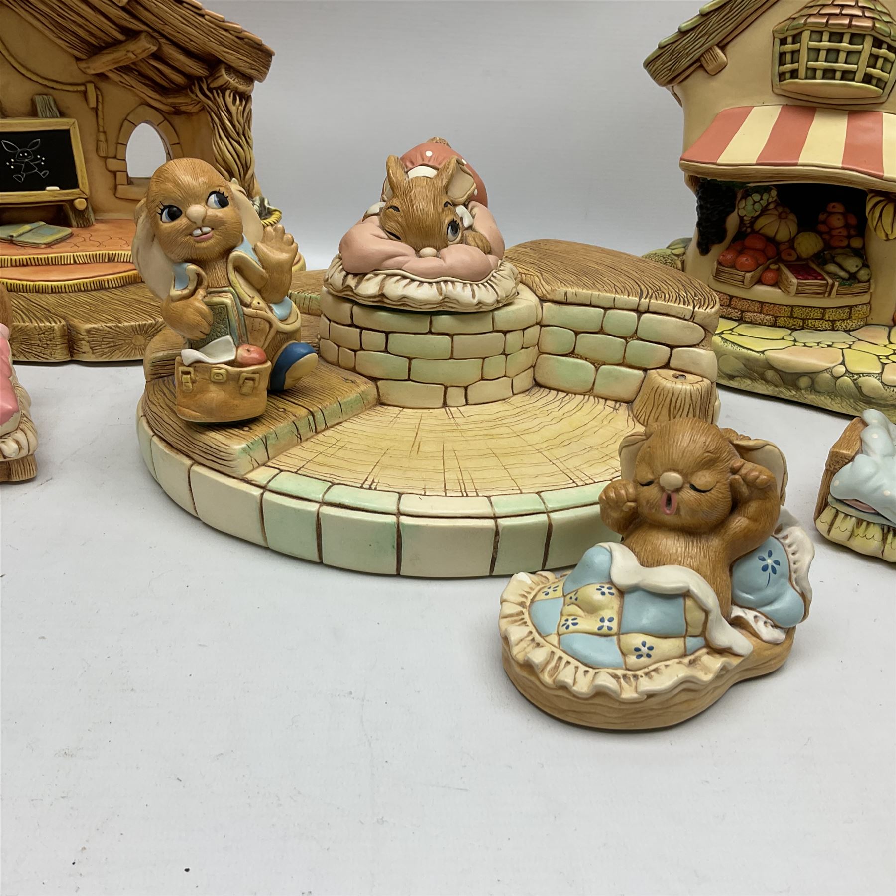 Collection of Pendelfin figures to include Band Stand 'Fruit Shop' and school house displays and six figures