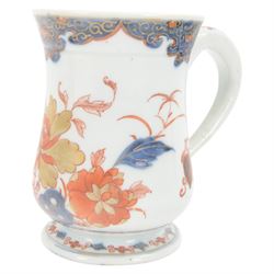 Pair of 18th century Chinese export tankards, each of bellied form with curved handle and circular foot, decorated in the Imari palette with peonies, chrysanthemums and bamboo, H12.5cm