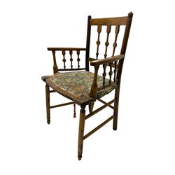19th century ash and beech Sussex type elbow chair, the back and arms with arrow shaped vertical rails, upholstered seat, on turned supports