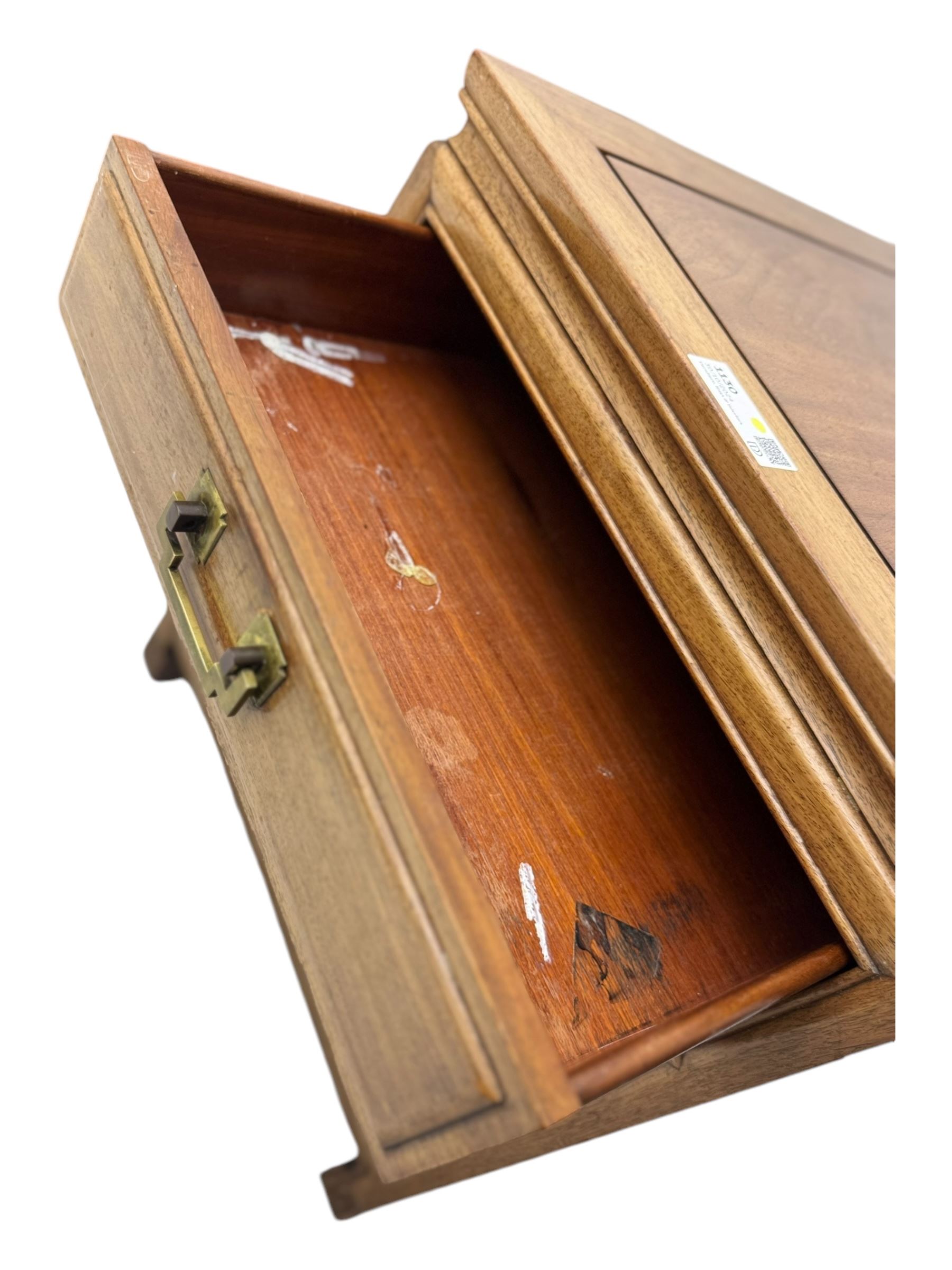 Chinese hardwood end table, rectangular form fitted with double cupboard, enclosed by panelled doors, on scroll carved supports (W51cm, H56cm, D66cm); Chinese hardwood end table, rectangular form fitted with single drawer over under tier (W51cm, H56cm, D66cm)