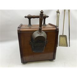 Victorian mahogany coal scuttle, the domed rolling lid carved with ornate foliate motifs opening to reveal interior with twin handled liner, mounted with carrying handle and shovel, together with brass fireside tools, largest H46cm