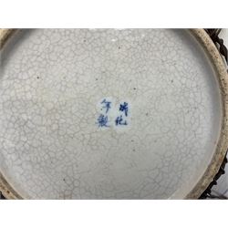20th century Chinese blue and white crackle glaze charger, decorated with peonies, prunus blossom, and rockwork, within simulated bronze border, with character mark verso, D34cm