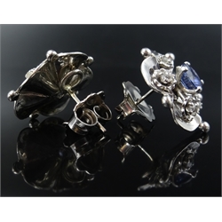  Pair of 18ct white gold sapphire and diamond flower petal ear-rings, stamped 750  