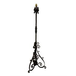 20th century wrought metal standard lamp, foliage leaf sconce on twist stem, the base of scrolled metal work