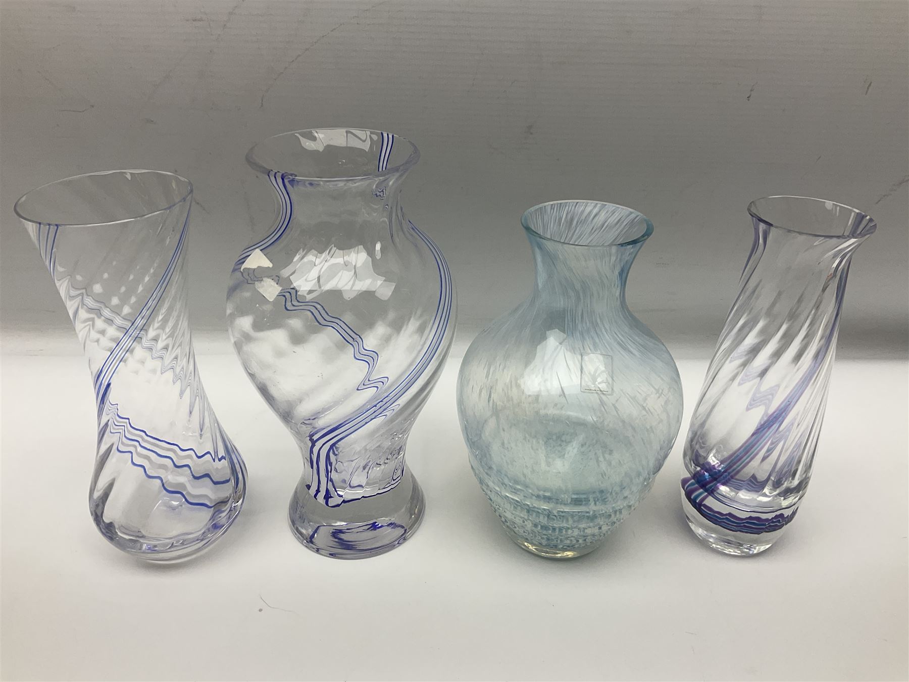 Collection of green/blue Caithness glass vases, to include mottled and swirl designs, largest 20cm (26)
