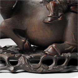 Early 20th century Chinese carved hardwood figural group of two boys on the back of a water buffalo on wooden stand W37cm