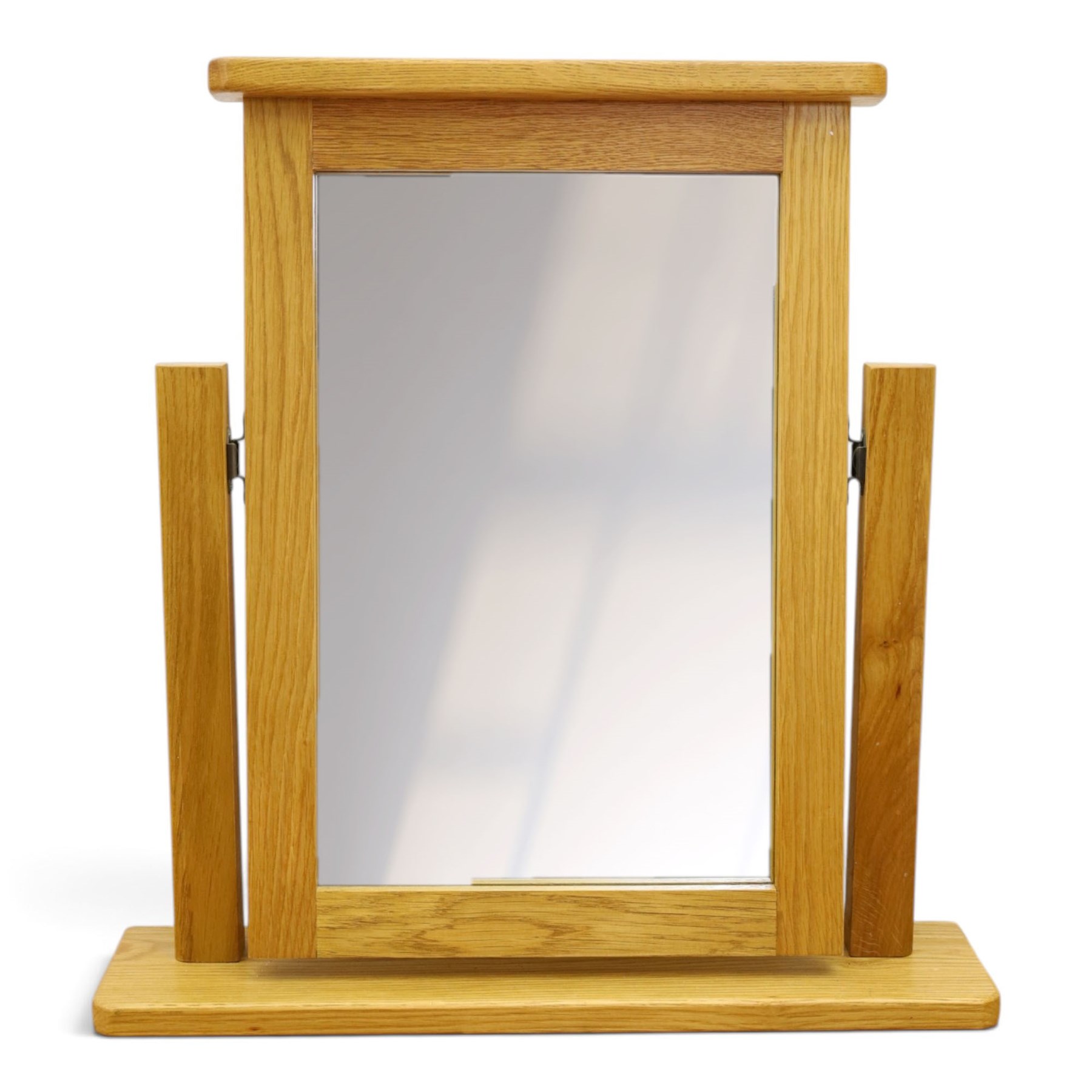 Contemporary oak kneehole dressing table and mirror, rectangular shaped top fitted with two drawers, on square tapering supports