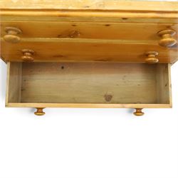 Two pine chests, comprising Victorian pine chest fitted with three  drawers with turned handles, shaped uprights extending to bracket feet, (H 83cm, W 77cm, D 41cm) and Continental pine chest fitted with three drawers with turned handles, on turned feet (H 81cm, W 100cm, D 51cm)