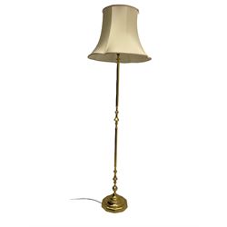 Pair of brass standard lamps with shades