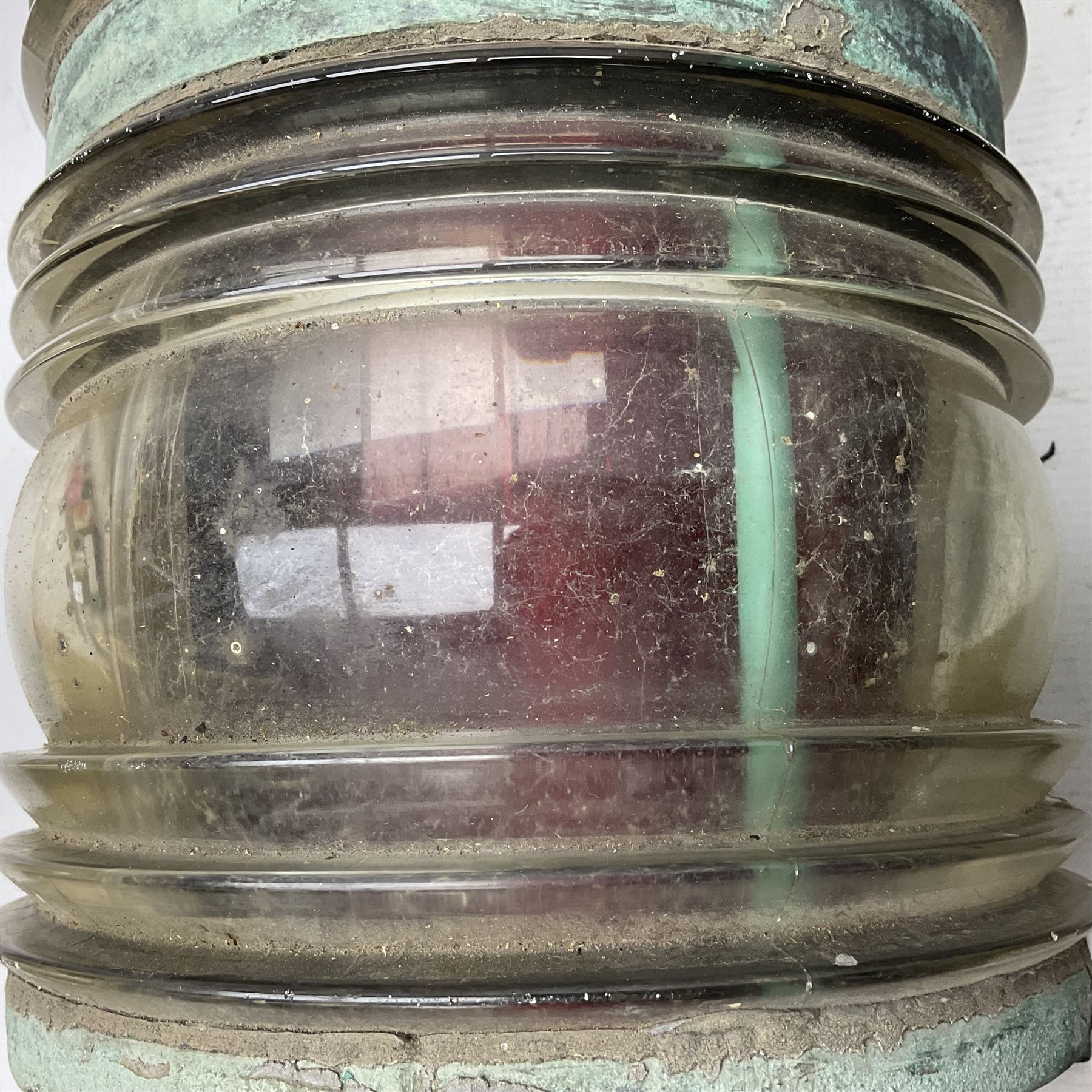 Two port and starboard brass lamps, each with a plaque marked 'Noack as Lanterne KL.A Serie 700 Type 704D Babord', ribbed green and red glass shades, H44cm