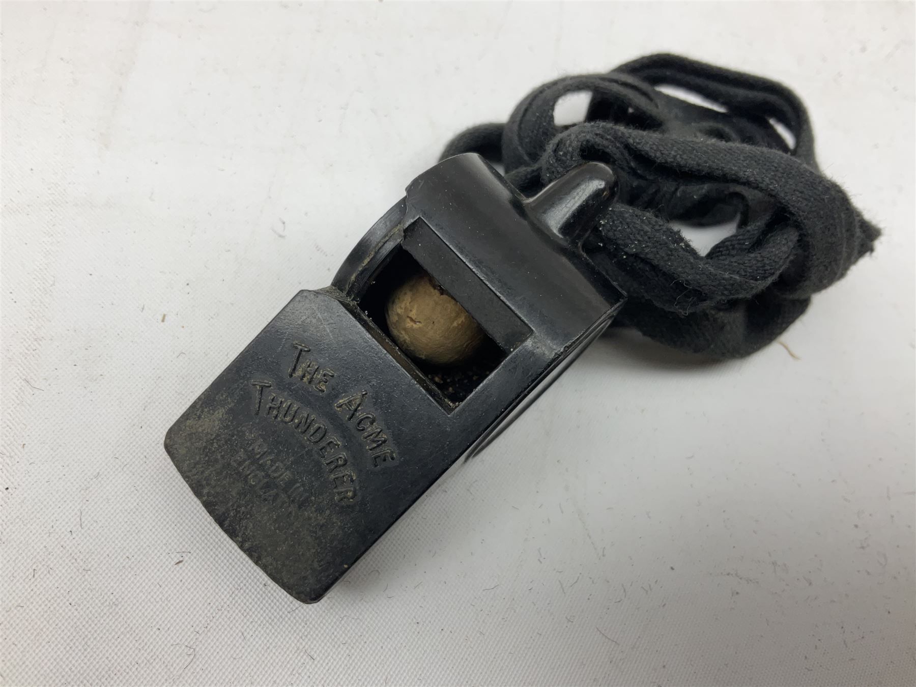 Black painted three colour railway lamp with revolving filters, H29cm; BR Acme Thunderer whistle; three railway peaked caps, two with BR Intercity 125 badge; small album of photographs of railway interest etc