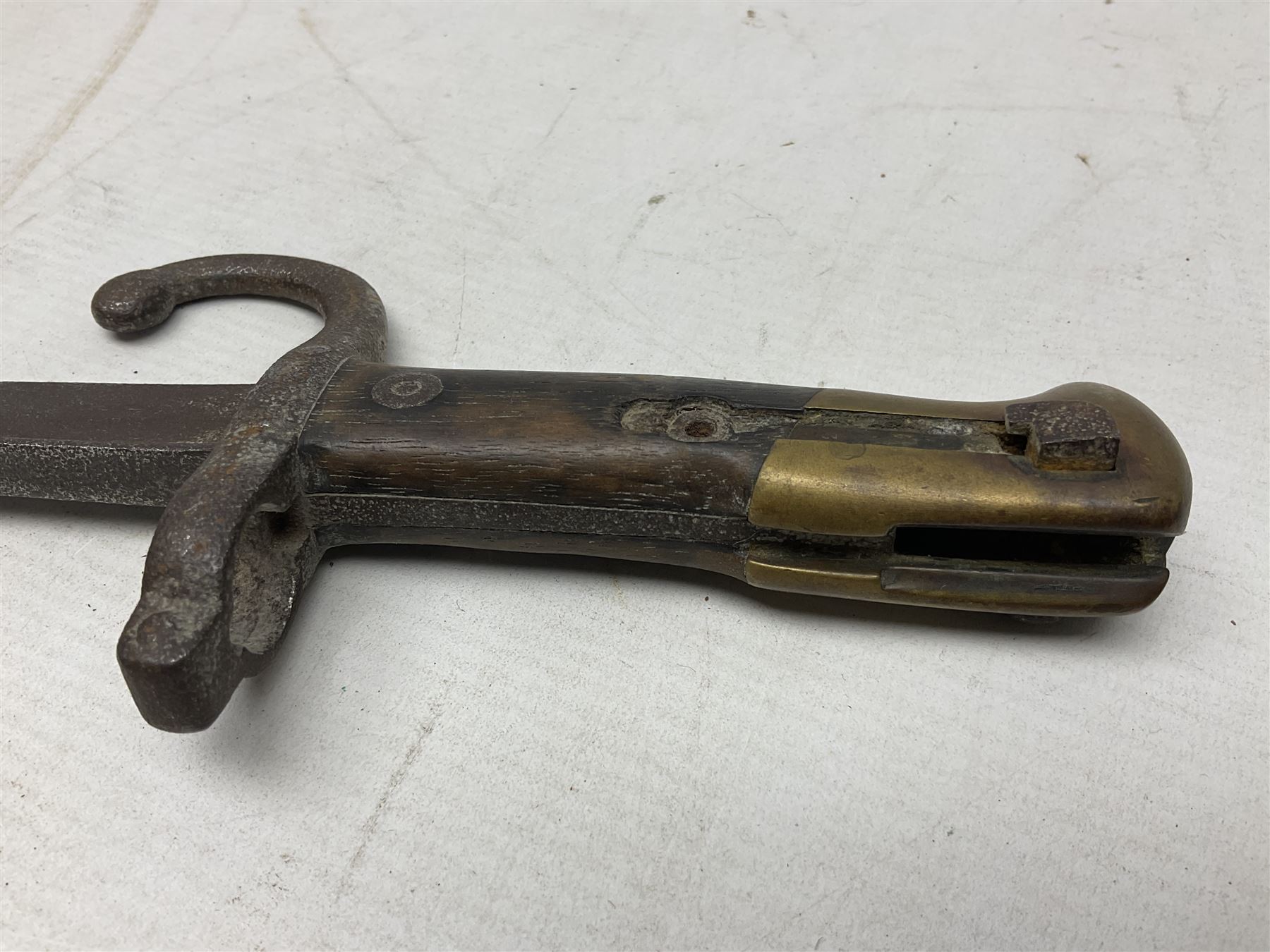 Five 19th century bayonets in relic condition without scabbards comprising British Pattern 1876 socket bayonet with Indian markings; French Model 1874 epee bayonet; and three French Model 1866 sabre bayonets (5)