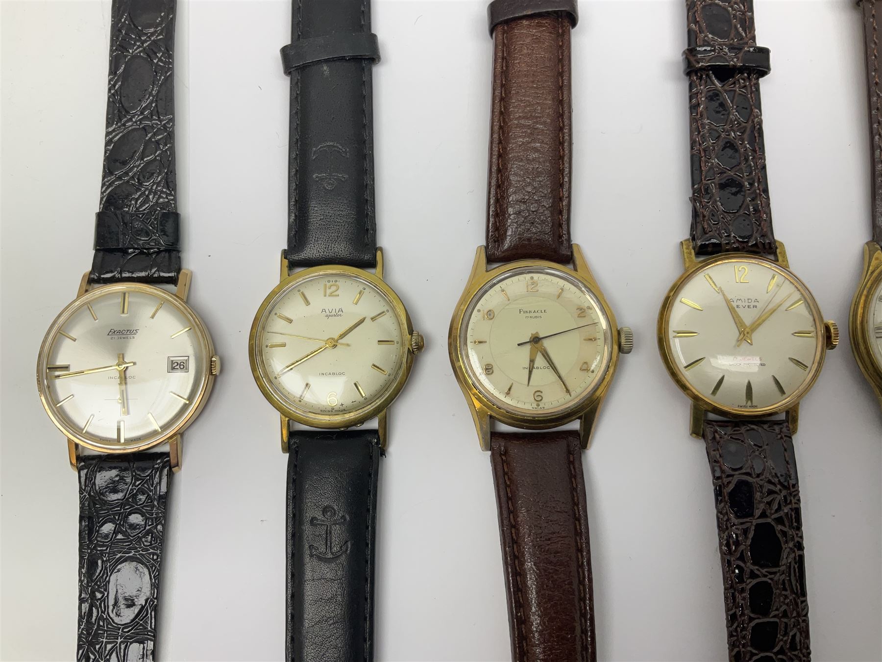 Ten manual wind wristwatches including Yeoman, Pinnacle, Avia, Walker & Hall, Argonaut, Roberts & Owen, Exactus, Uno, Amida and Elco