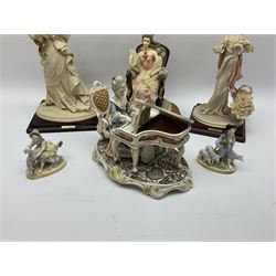 A small pair of Sitzendorf figures modelled as shepherd and shepherdess, H10.5cm together with a Dresden porcelain figure modelled as a female figure playing the piano, H17cm, a Naples figure with floral bouquet, H27.5cm,  a Naples figure holding a dog, H33cm, and a Leonardo Collection figure, Interlude, H24cm. 