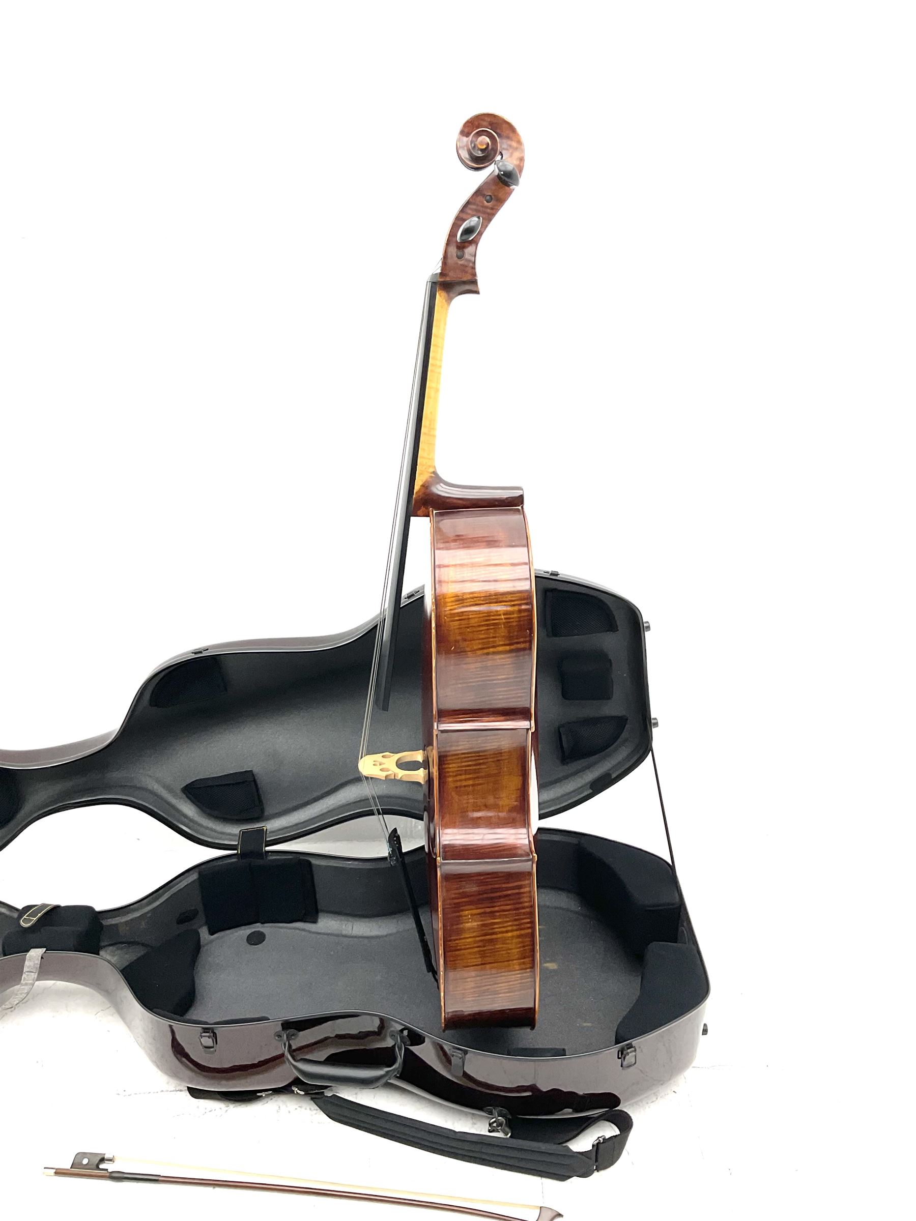 Alfred Stingl by Hofner cello, model AS-360 with 75.5cm two-piece maple back and ribs and spruce top, bears label with serial no.JO411-0706, L122cm; in carbon-fibre carrying case with bow