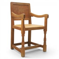 Mouseman - oak panel back carver armchair, with commemorative back panel engraved 'In memo...