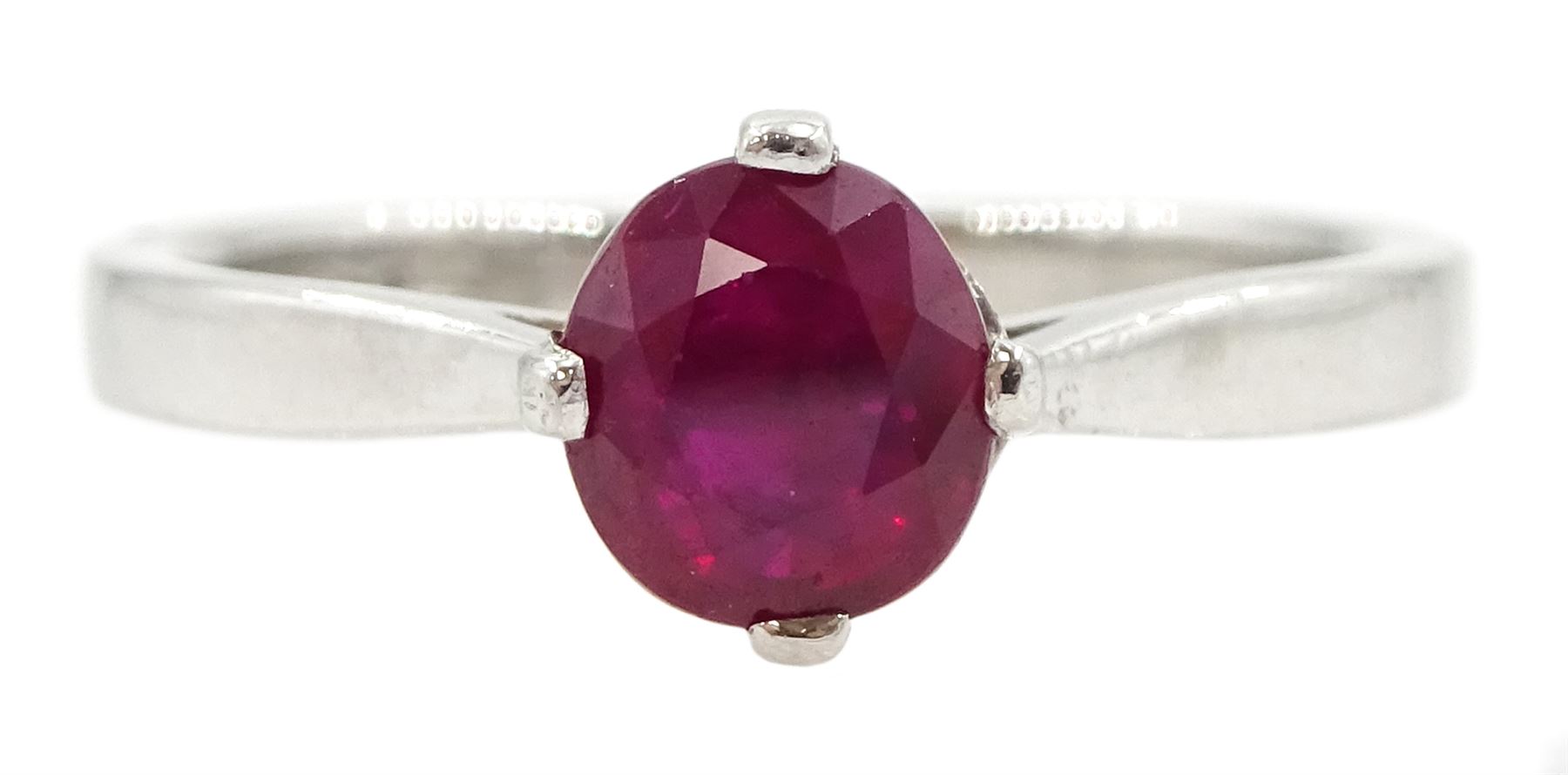Platinum ruby ring, four claw set with a single oval cut ruby of approx 1.00 carat hallmarked
