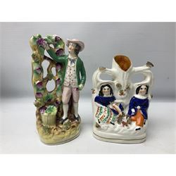 Collection of 19th century and later Staffordshire figures, to include a pair of Red Riding hood spill vases, Fortune Teller, man picking grapes, etc  