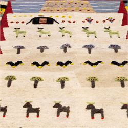 South West Persian Qashqai pictorial flatweave kilim, ivory field decorated with rows of stylized animals, bird and tree motifs applied in raised wool pile against a flat-woven ground, arranged in horizontal bands beneath a simple geometric panel enclosed by a broad red ground border with polychromed geometric devices 
