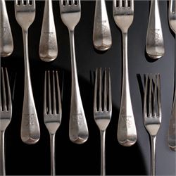 Suite of Edwardian silver rat tail cutlery engraved with a crest comprising twelve table forks, eleven dessert forks, twelve table spoons, eleven dessert spoons, nine teaspoons, soup ladle, pair of sauce ladles and basting spoon Sheffield 1901/02 Maker John Round & Son Ltd