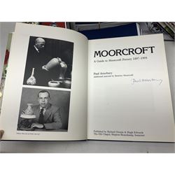 Moorcroft, 1897-1993 revised edition; an illustrated guide to Moorcroft Pottery, a hard back book by Paul Atterbury, together with a quantity of Moorcroft Collector's Club magazines