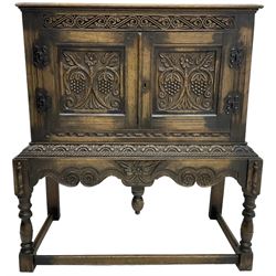 Jacobean Revival carved oak cupboard, mo