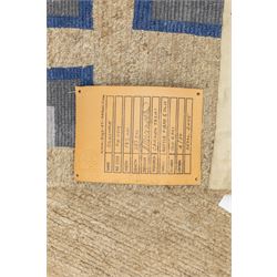 Rugs by Design - ‘Silk Stone’ Nepalese thick pile wool rug, with plain textured camel ground and geometric border detail in blue, grey and dark tones to all four sides